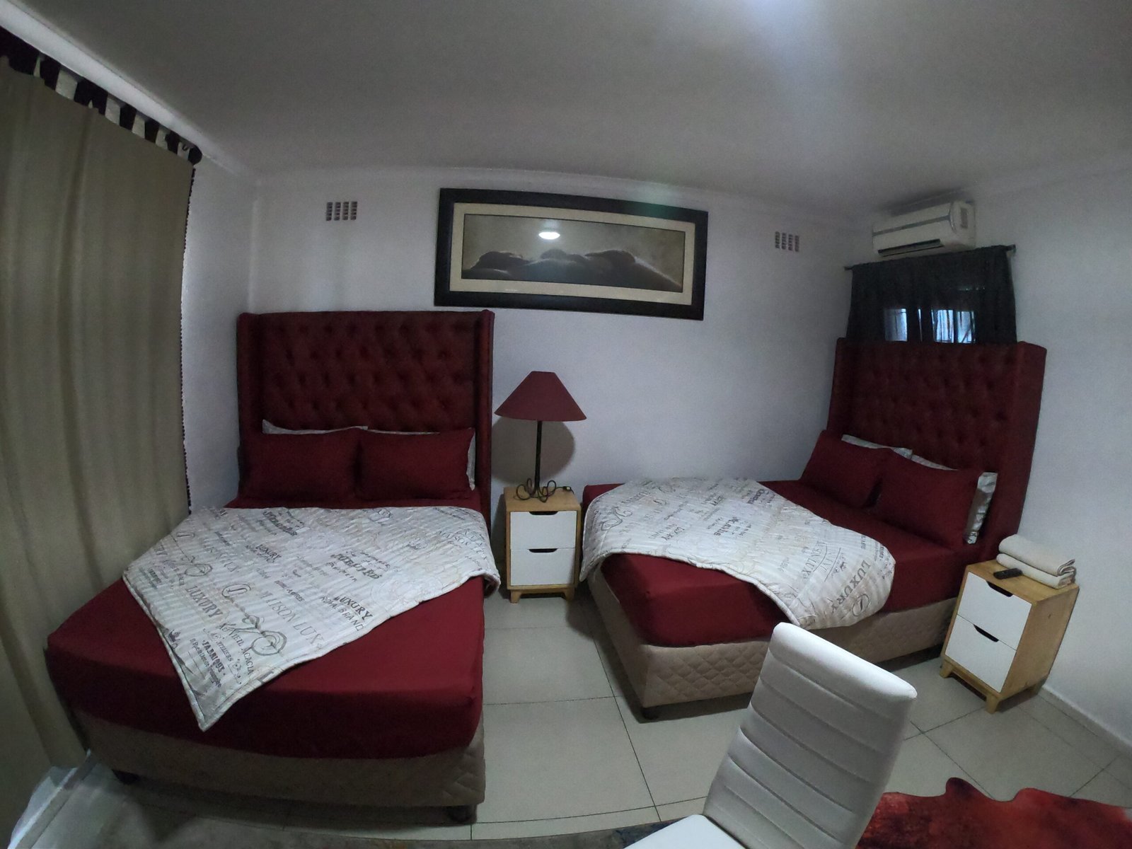 Premium executive suite at Galaxy Sleep N Go in Goodwood, featuring a large work desk and seating area